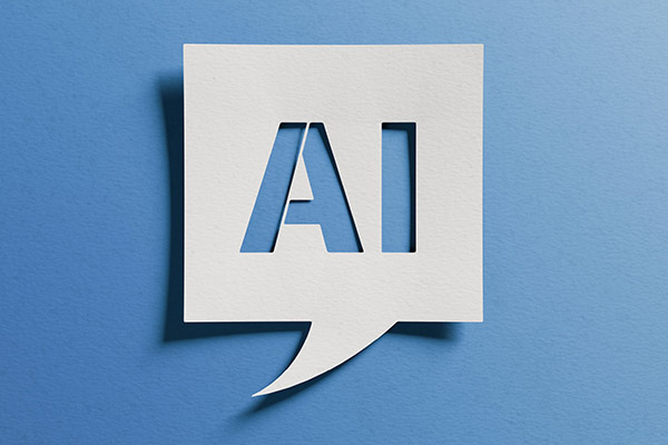 Blog on Using AI to Complete Tedious Tasks: Image of letters "AI" in a speech bubble