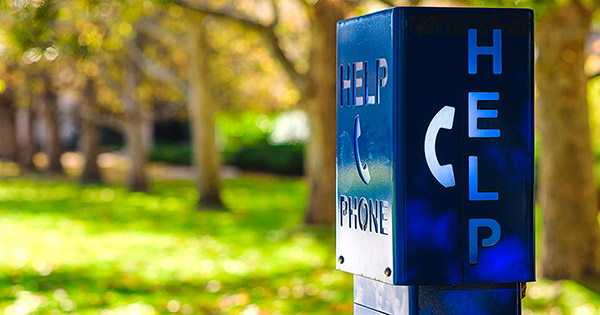 Blog on campus safety: Blue emergency box labeled "HELP" on a campus